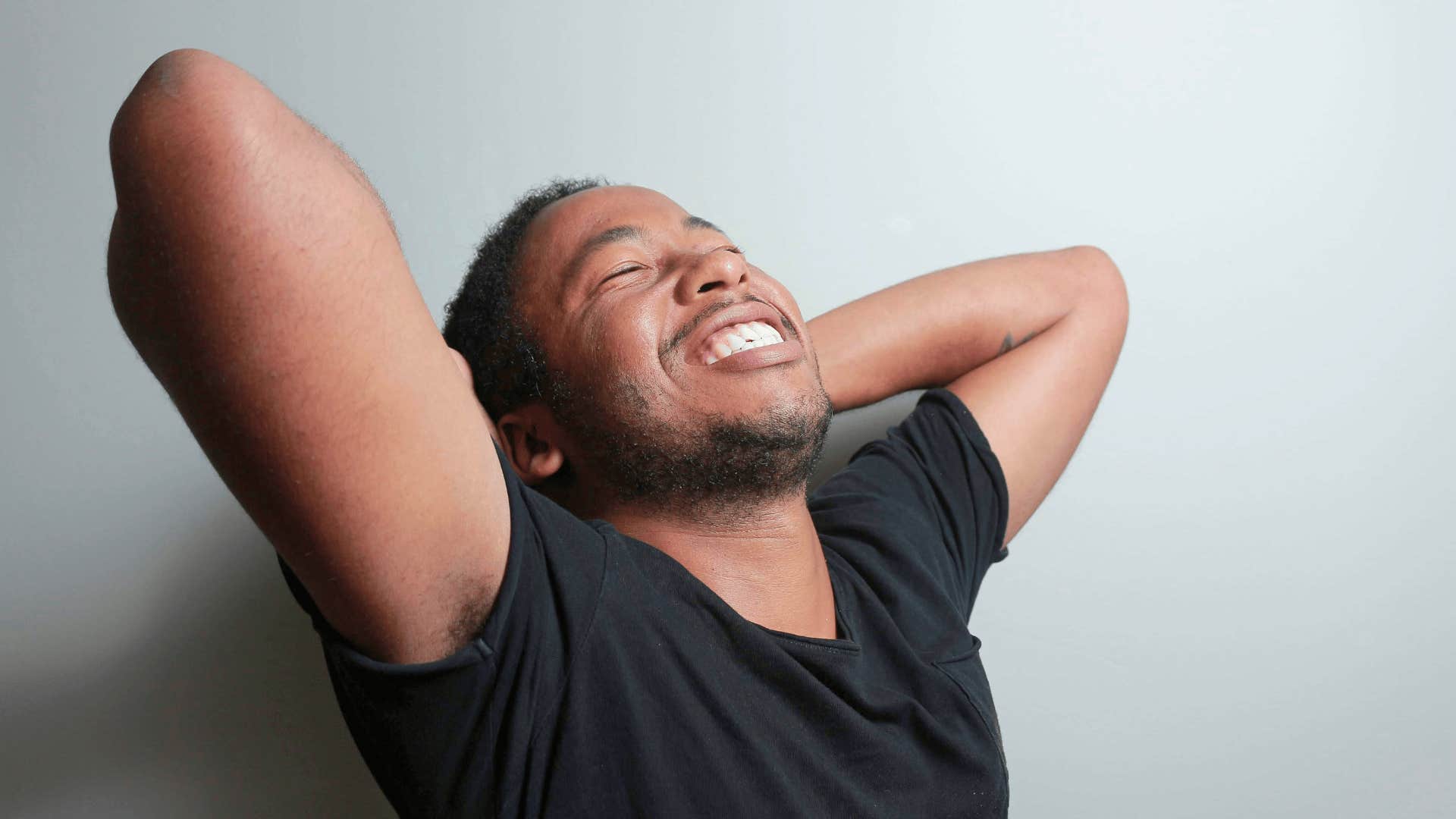 joyful young man smiling