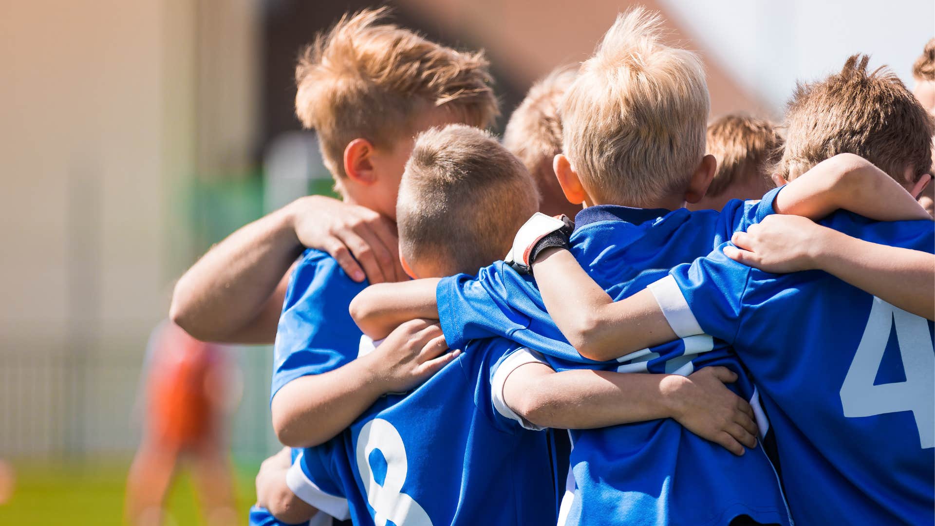 Active children huddle at sports even showing way kids feel seen