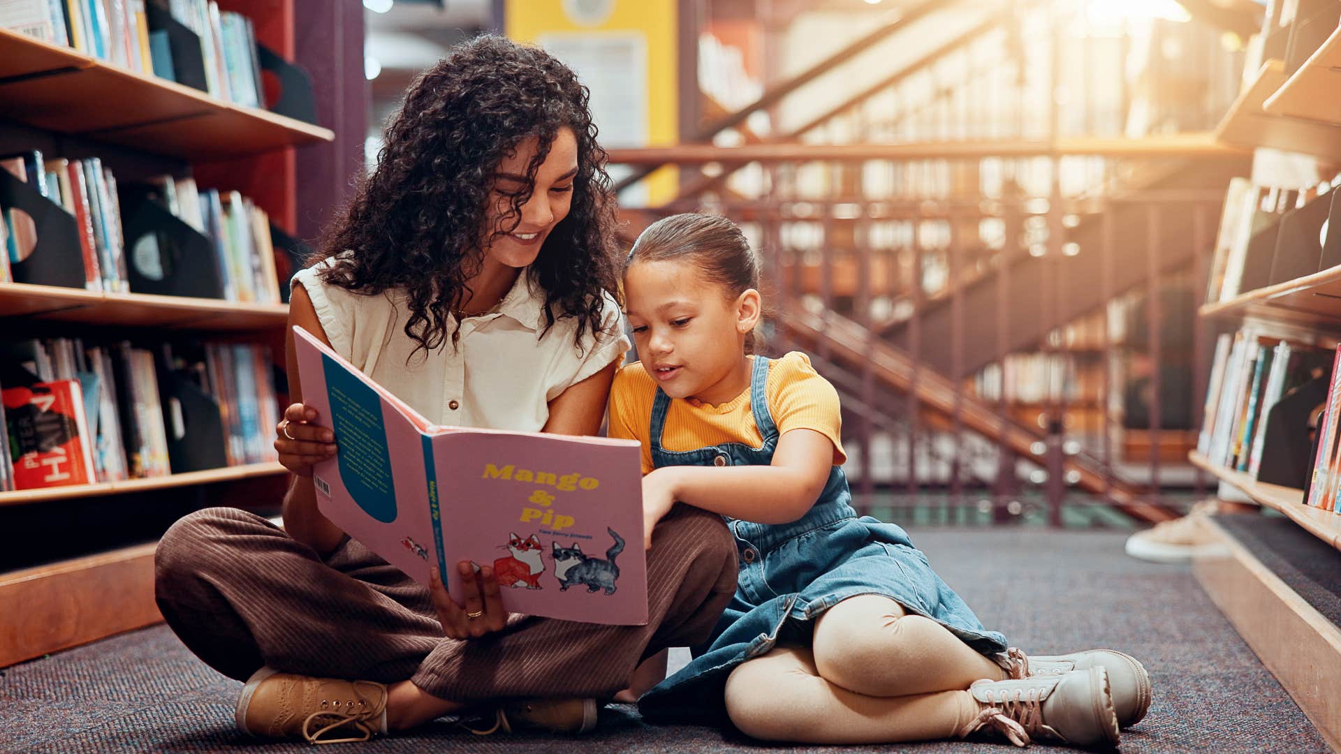 interested child and parent read together showing way kids feel seen