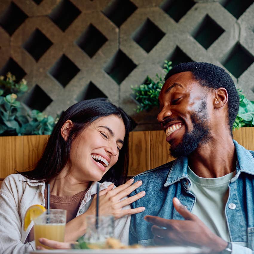 Woman becoming more attractive to date because laughing jokes also feeding her brain