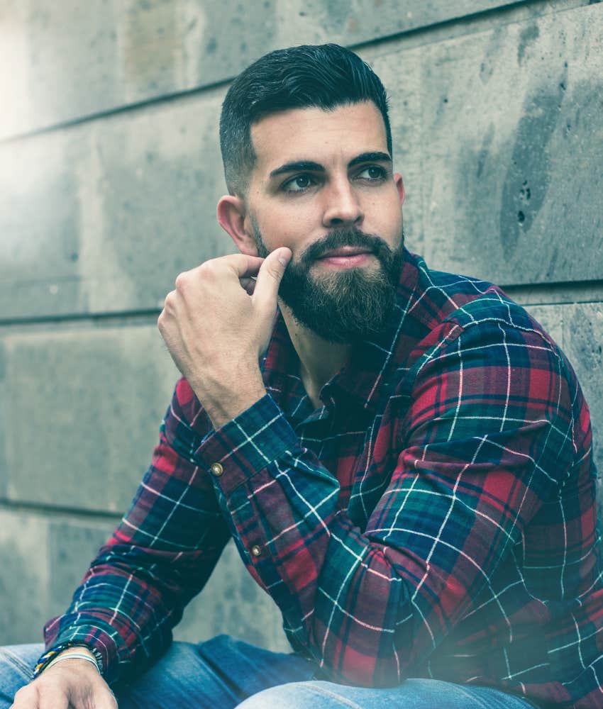 Millennial man thinking back on his youth and reaping the mental health benefits