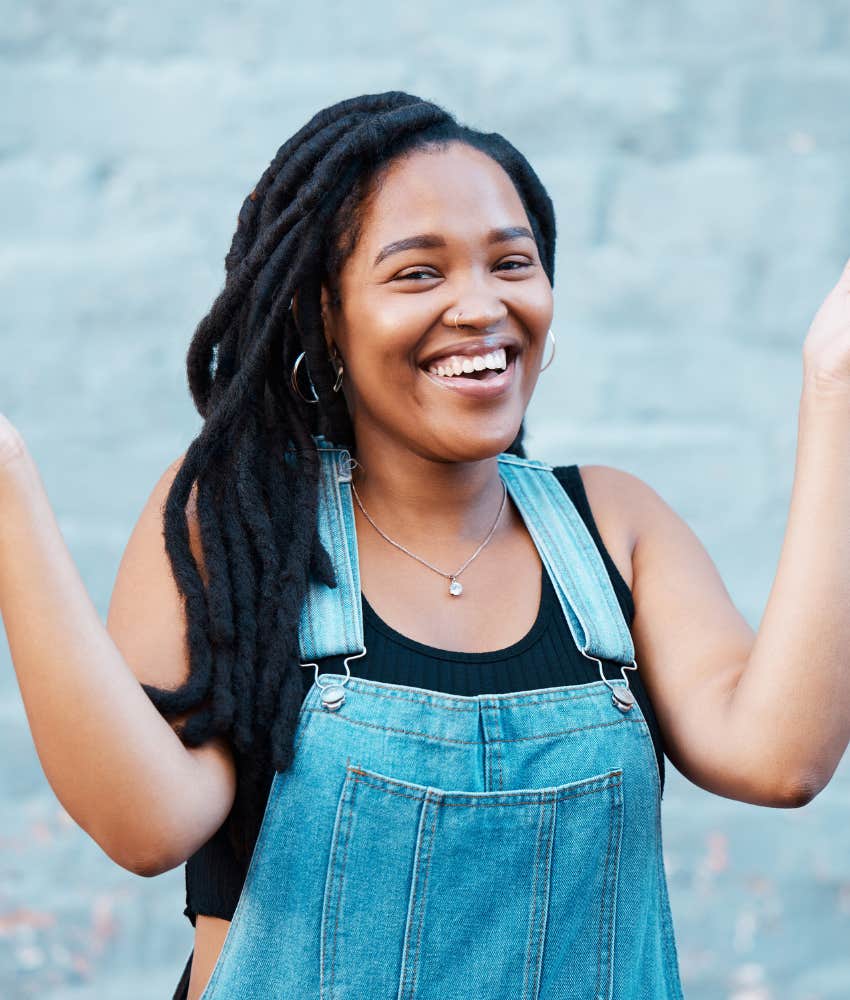 Happy person laughs to improve life