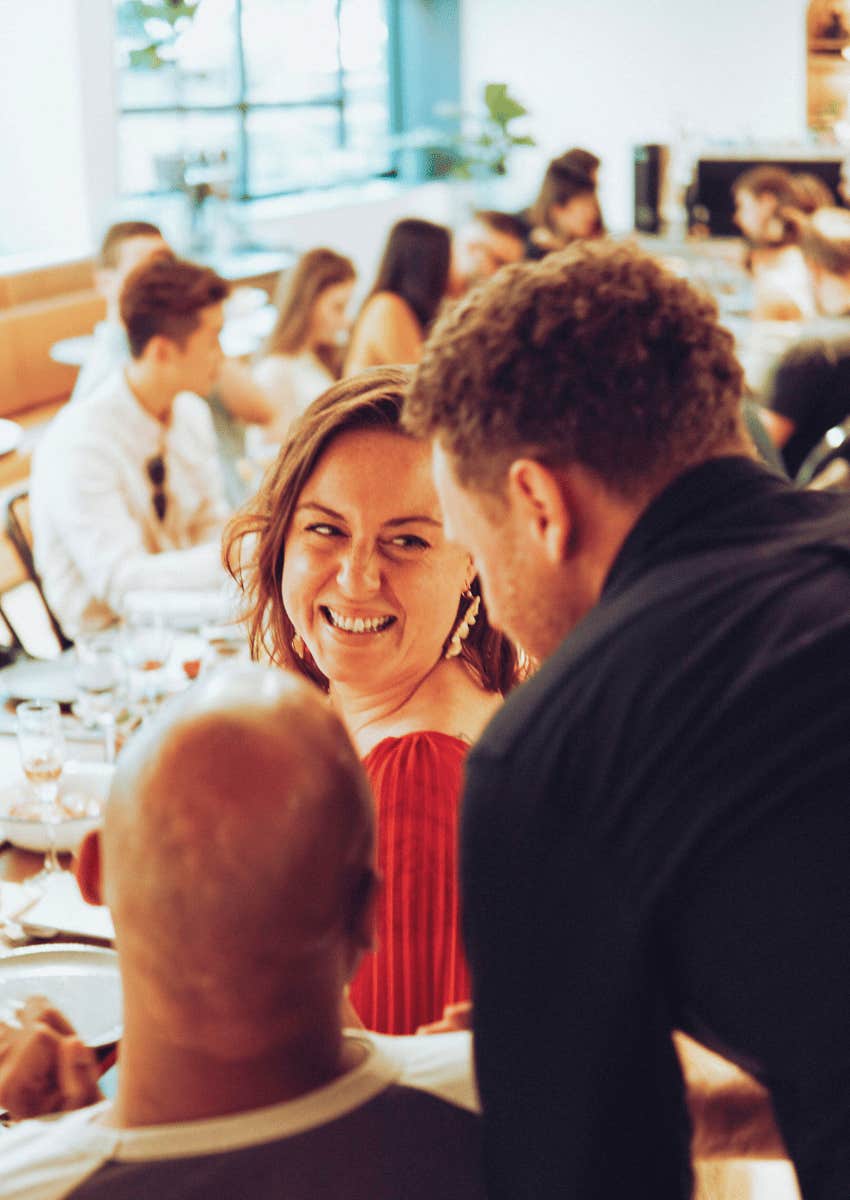 man introducing best friend to woman