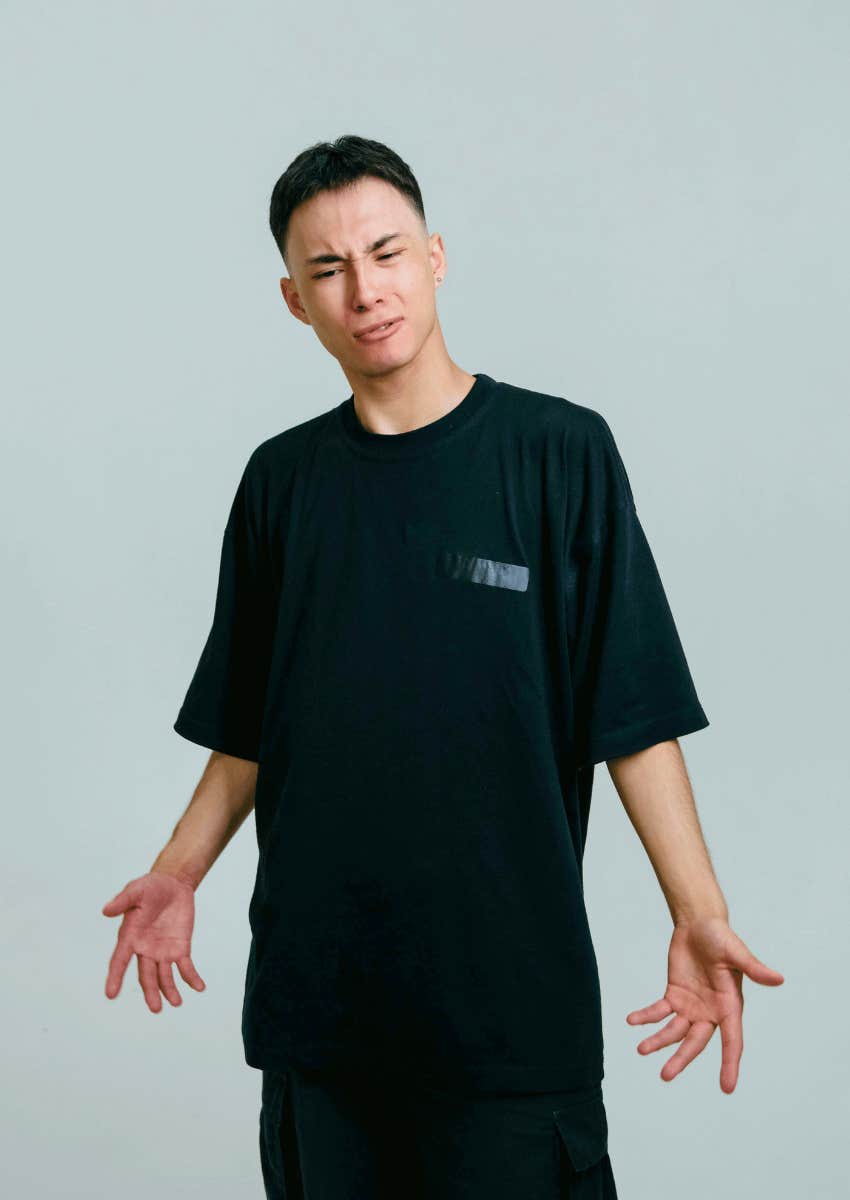 man standing in a defensive posture