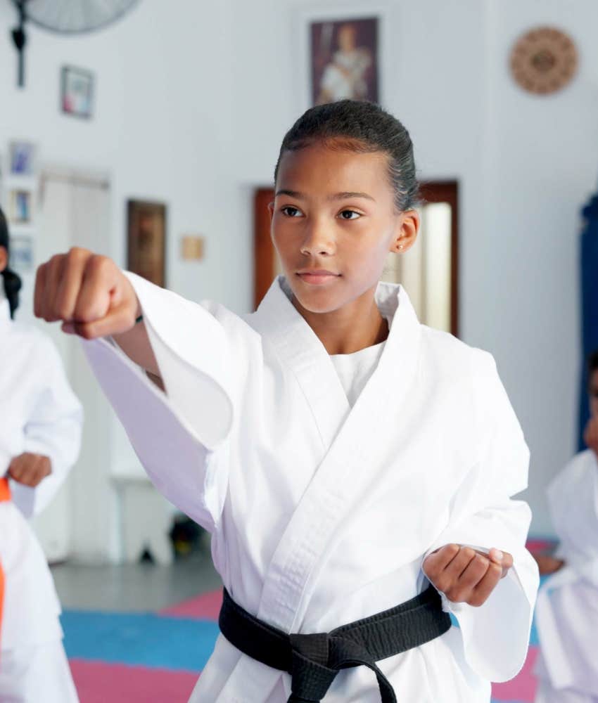 young girl practicing martial arts hobby handle anything life throws them