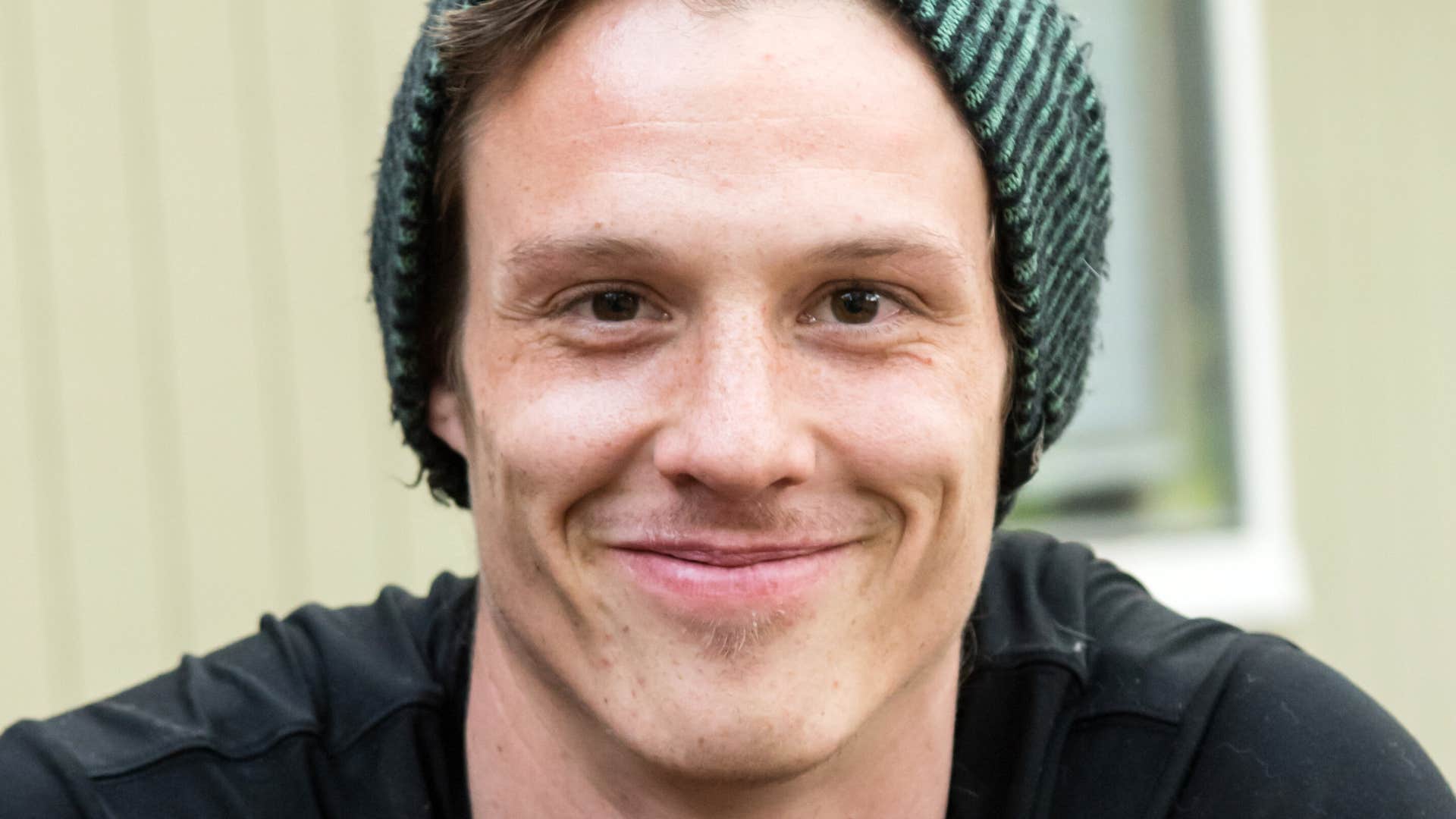 man using his expressions to convey his feelings