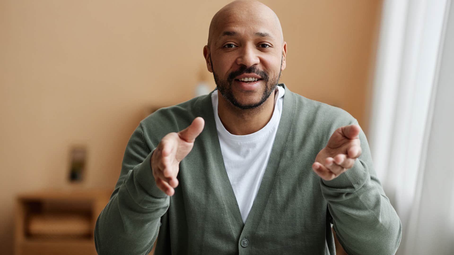 man showing his feelings through facts