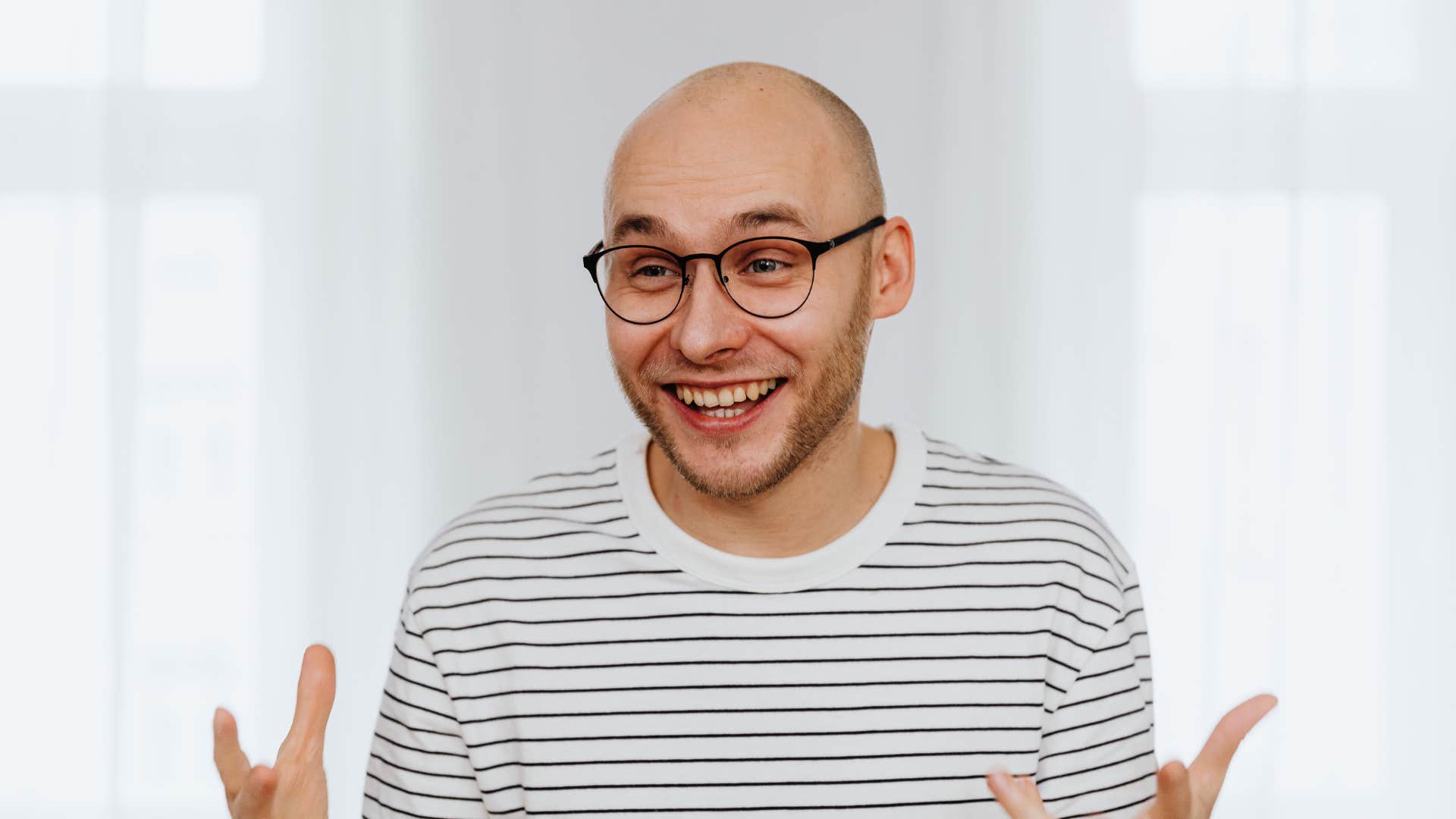 man showing his feelings through jokes