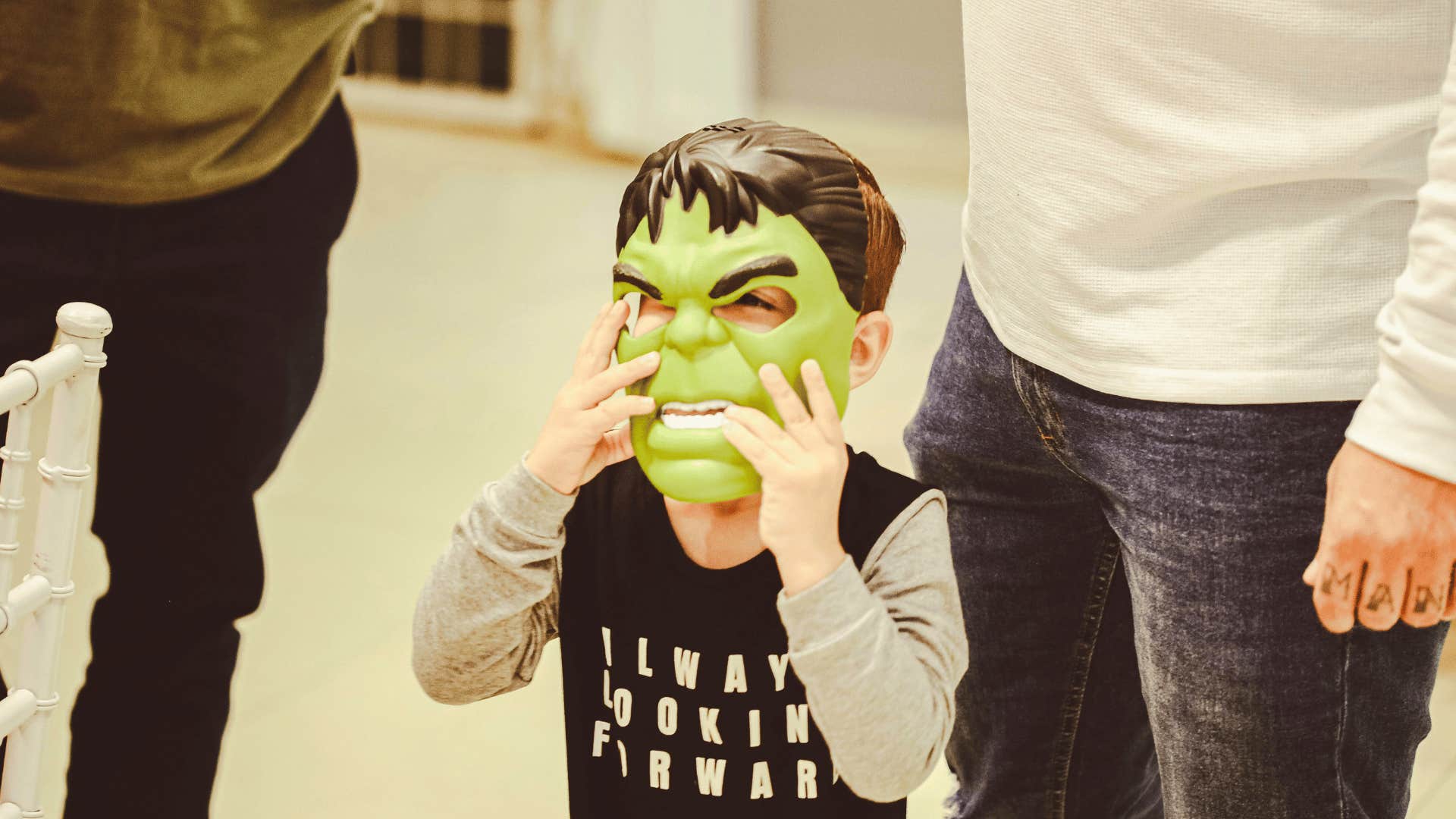 modern parent letting kids be superheroes