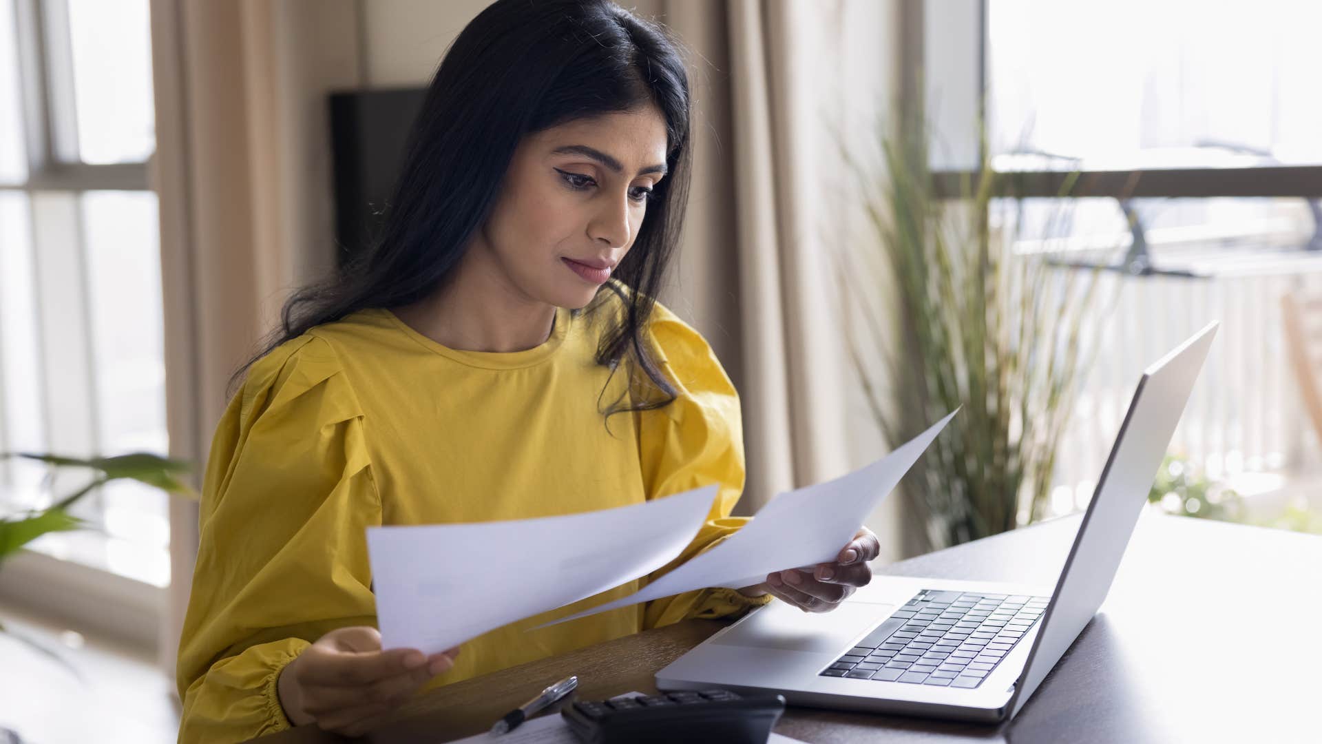 woman who had a rough childhood trying to make mature decisions with paperwork