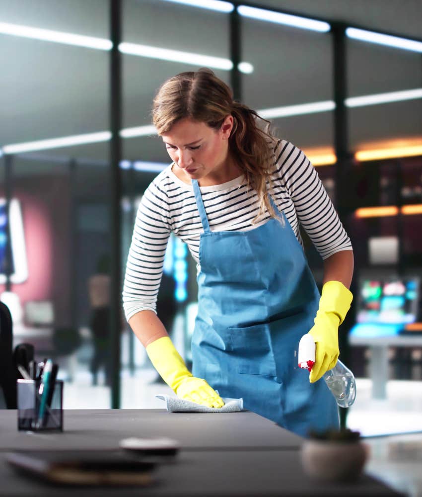 woman cleaning in office building
