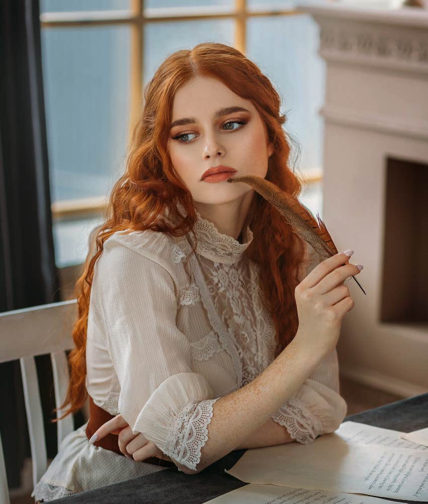 woman practicing old-fashioned habit of keeping commonplace book