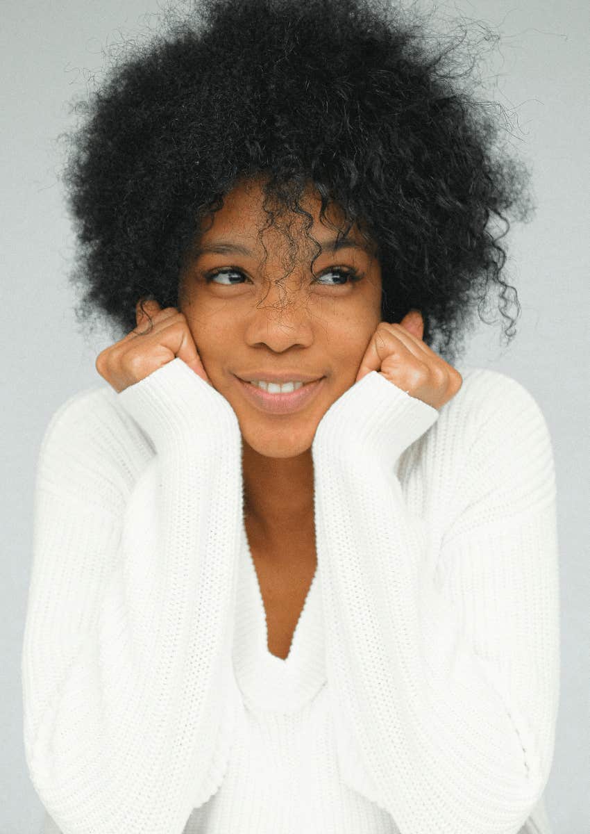 peaceful young woman letting go of frustrations