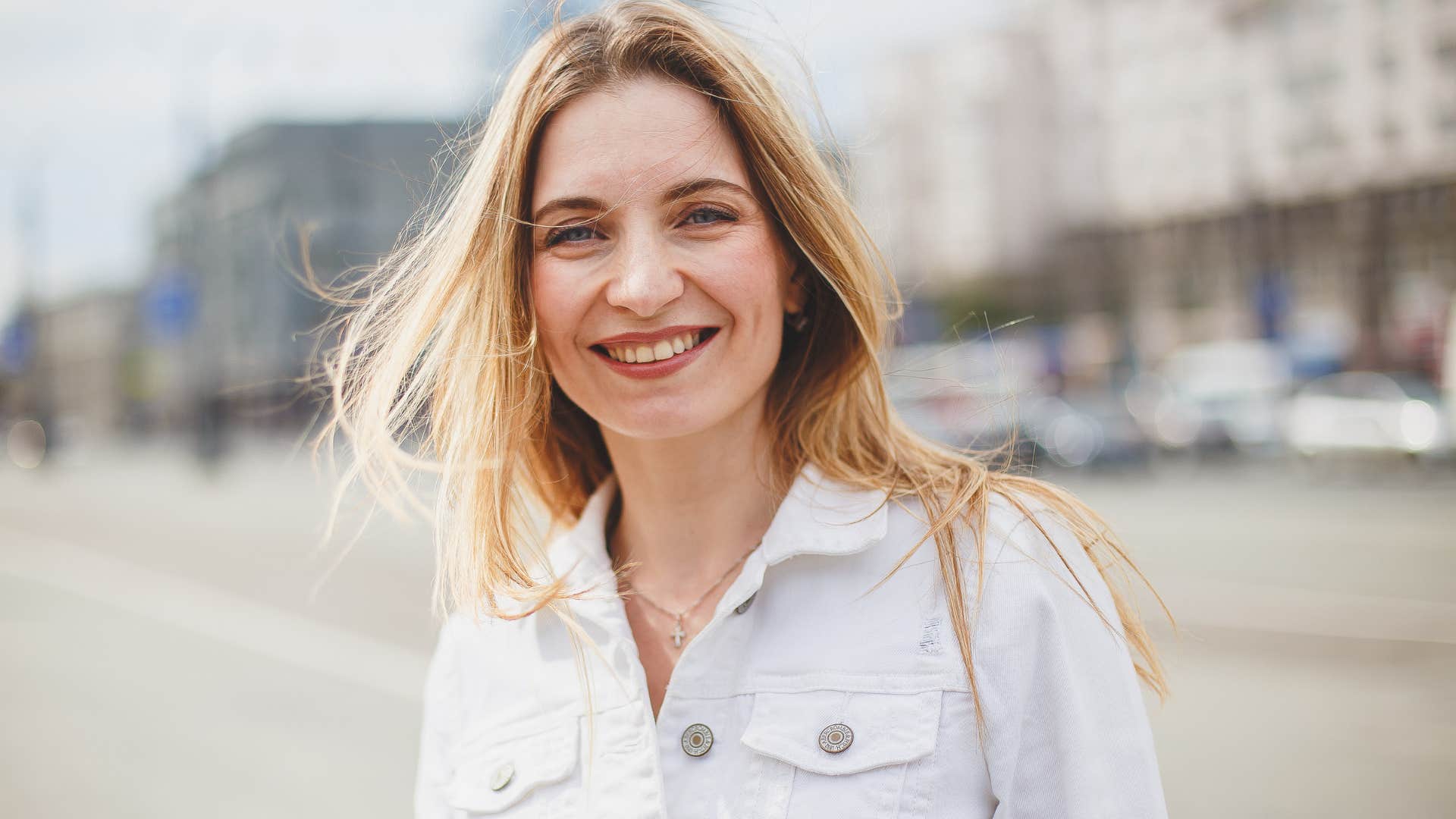 smiling woman with a strong sense of integrity