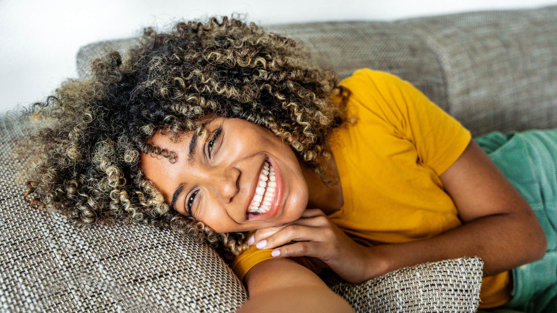 Happy person relaxes to manage stress showing lifestyle change for mental health