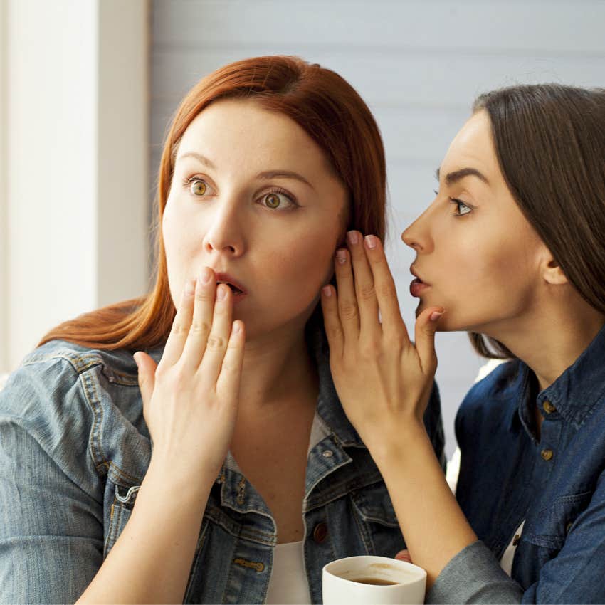 two friends gossiping with each other
