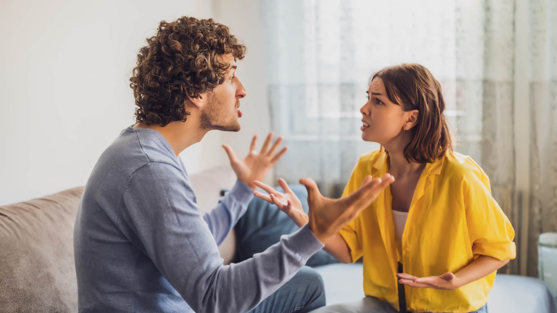 couple arguing as woman in yellow rehashes old discussions