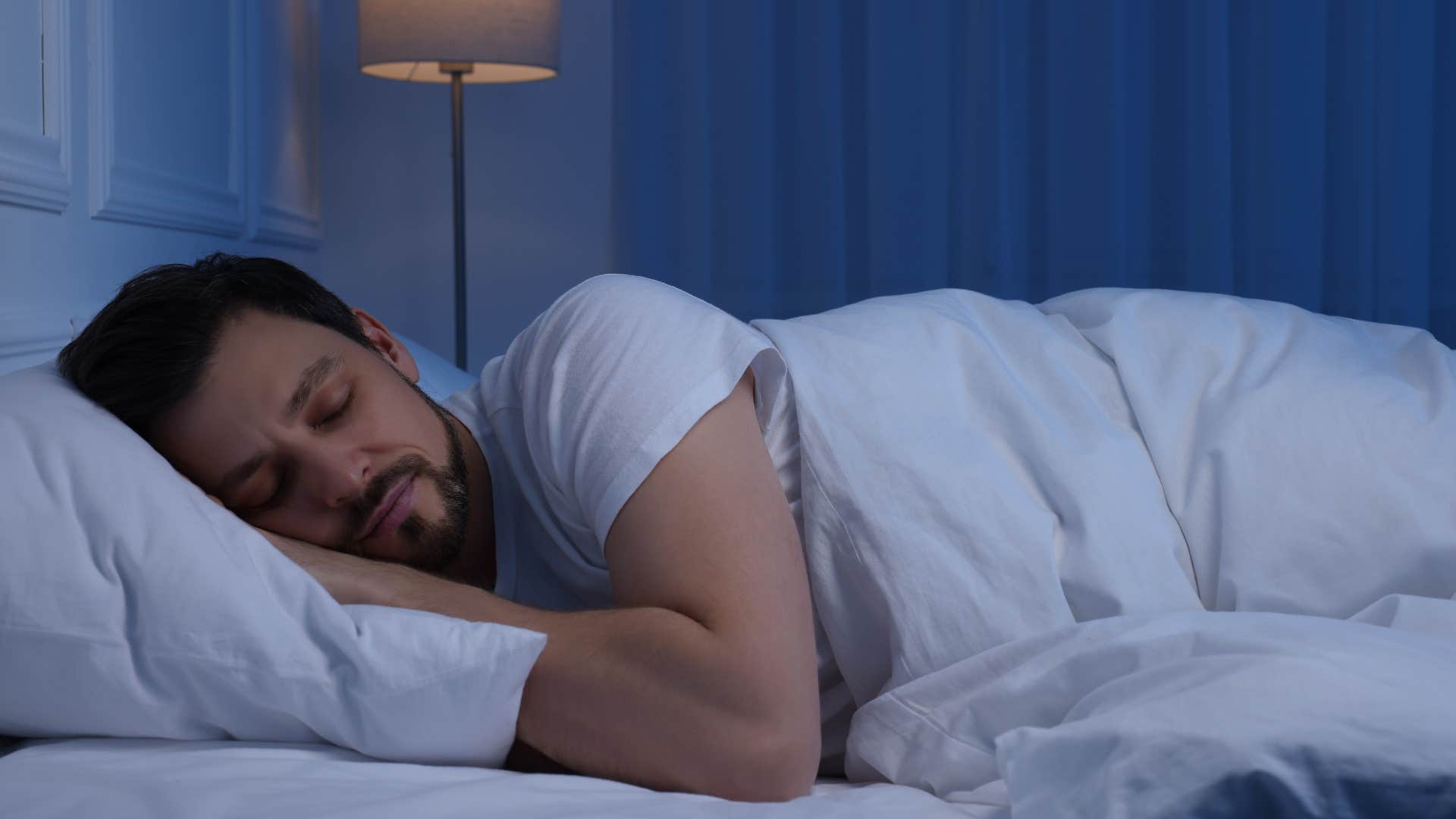 man who can't sleep well at night when the heater is on because he is a light sleep