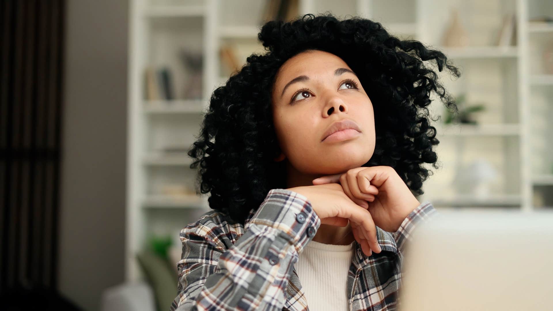 woman who can't sleep well when the heater is on because she is an overthinker