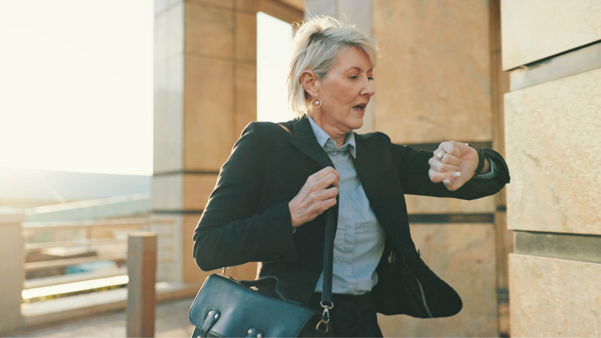 very busy woman in a hurry looking at her watch