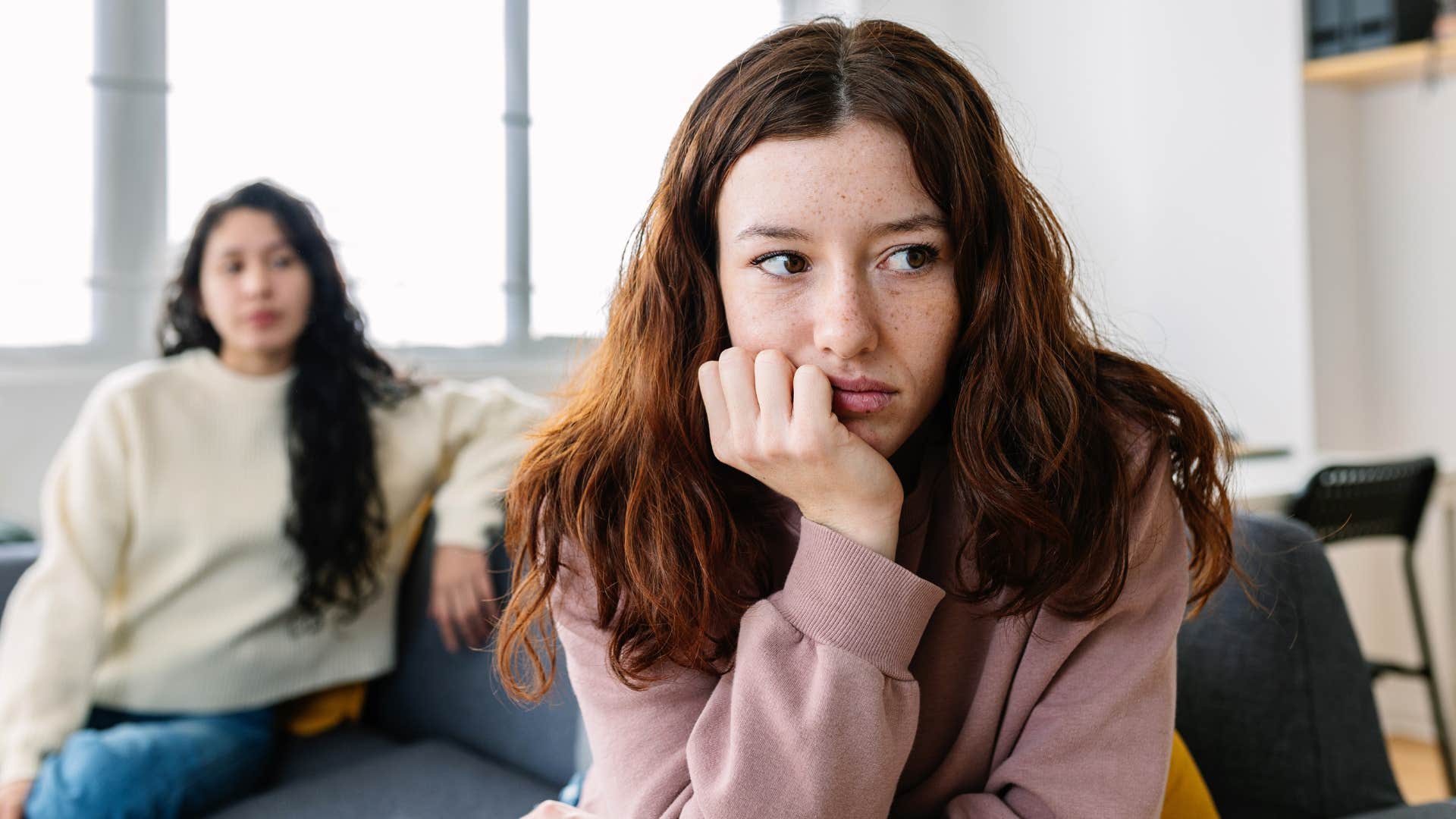 woman avoiding tough conversations with close friend