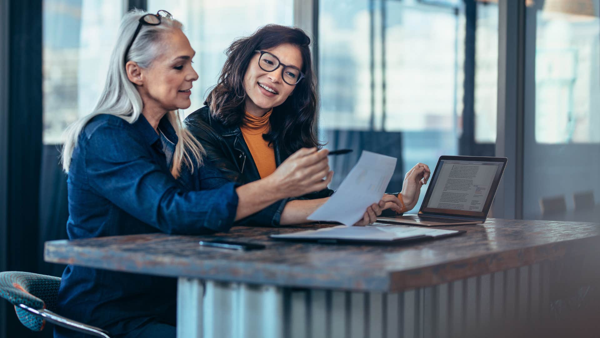 two women chatting as one woman asks Where did you learn about this