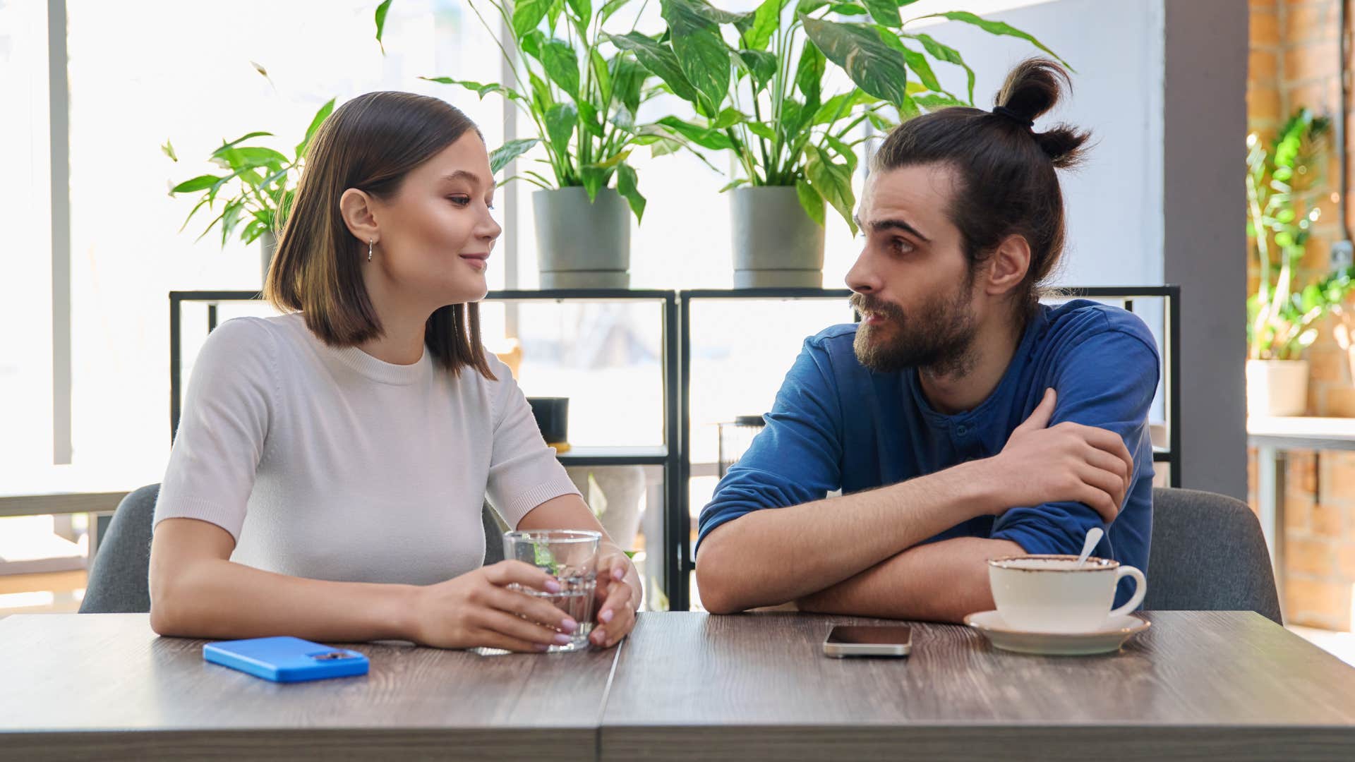 couple talking over tea saying it's complicated