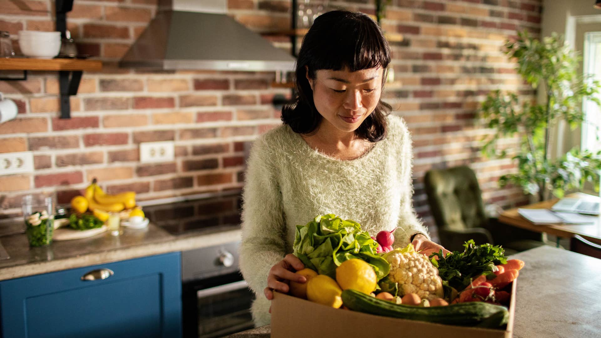 Caring person bough healthy vegetables showing thing to rebuild life