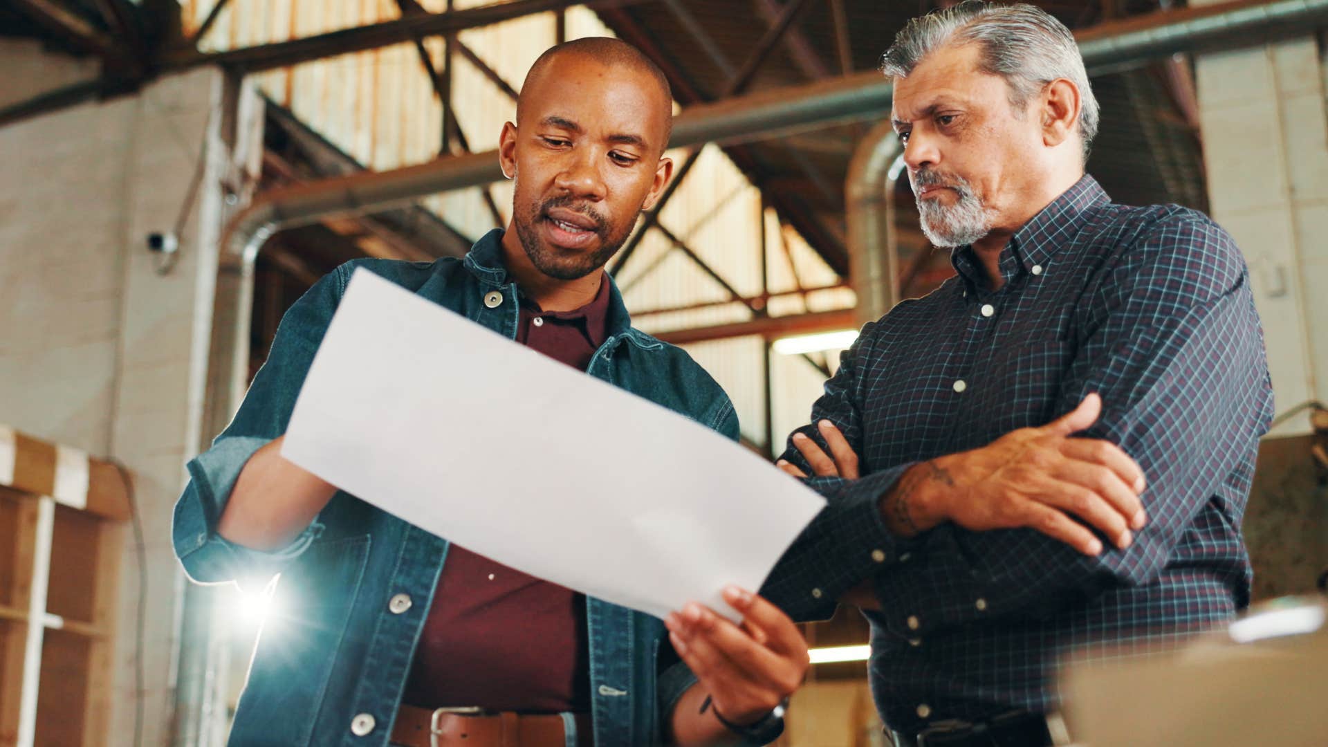 men at work who are creative thinkers talking about project