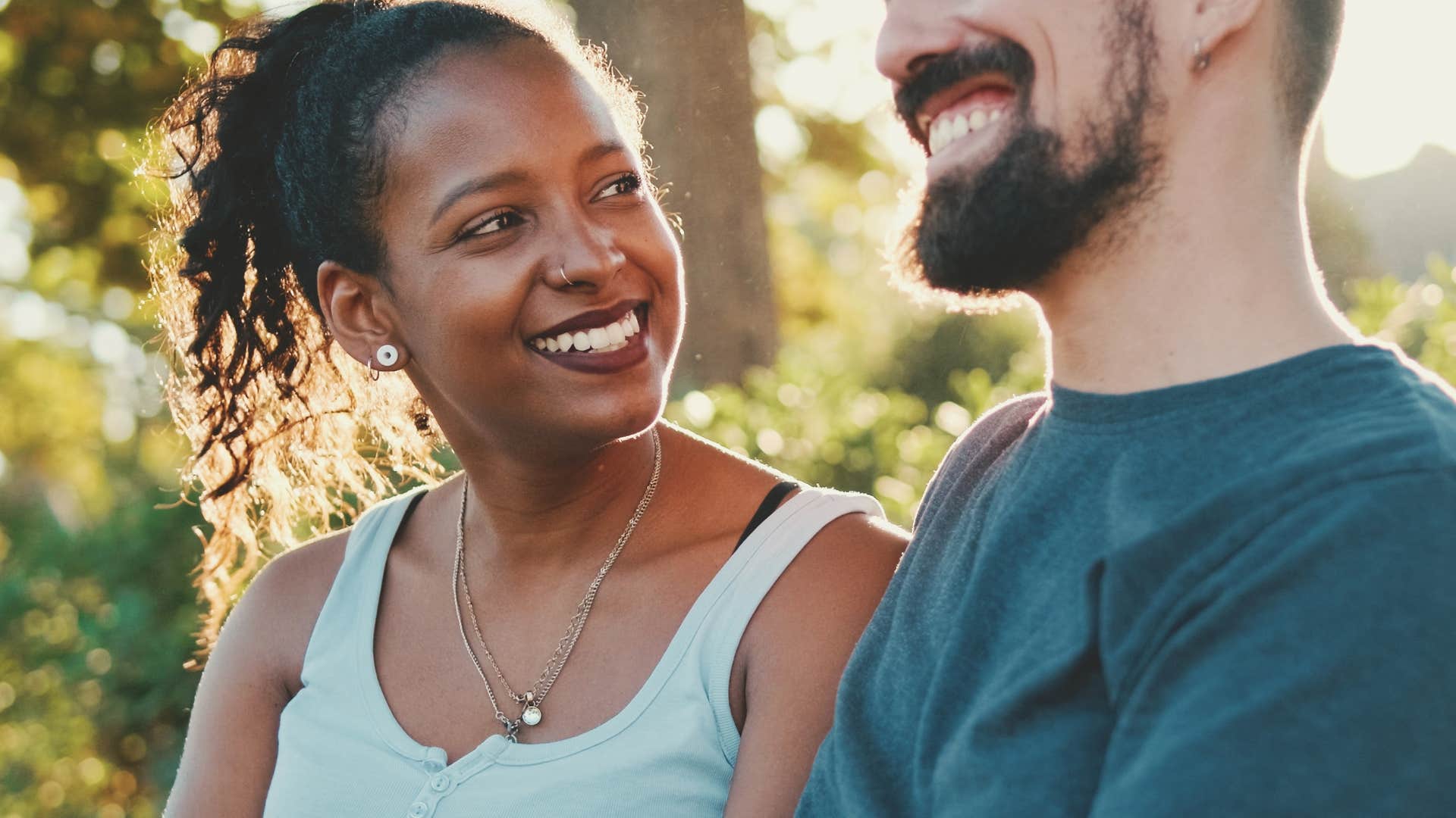 woman who's intuitive about social energy talking to her partner