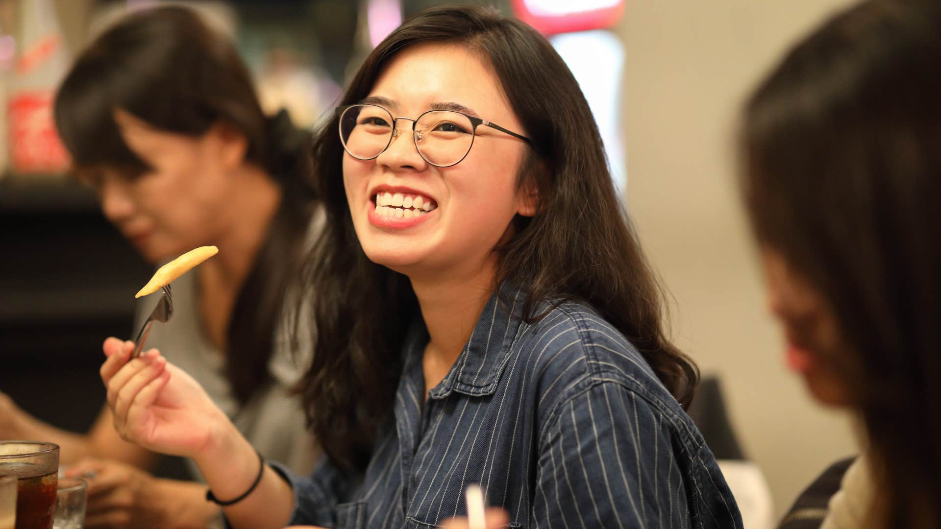 woman who almost never eats her meals at home because she finds connection over food