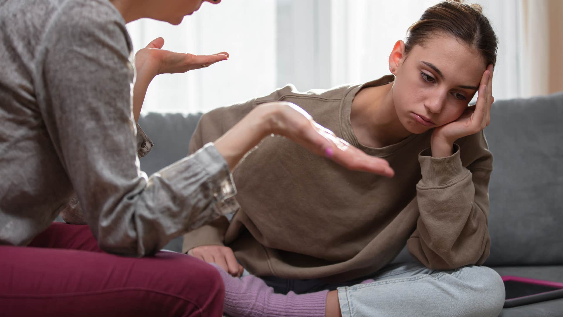 Woman saying "I'm used to it" to her mother.