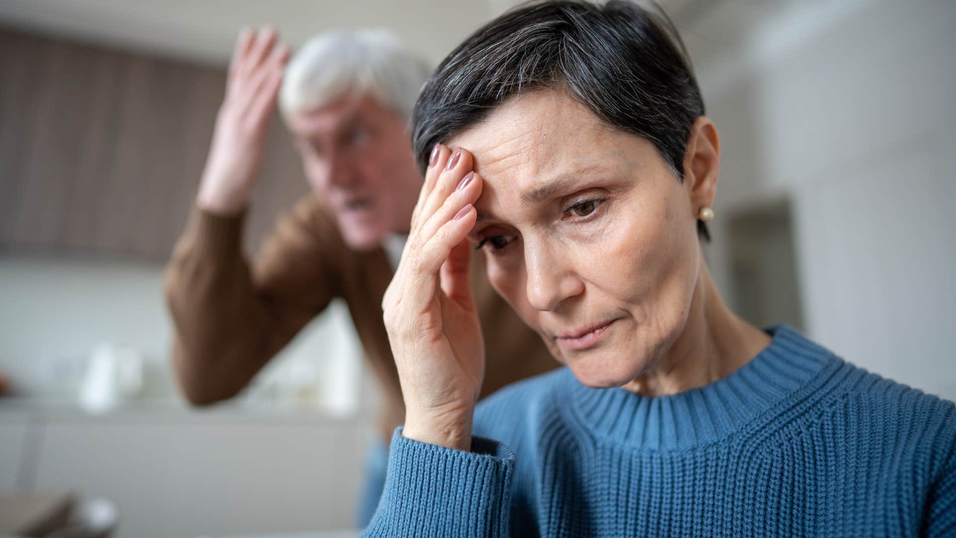 Woman saying what's the point to her partner at home