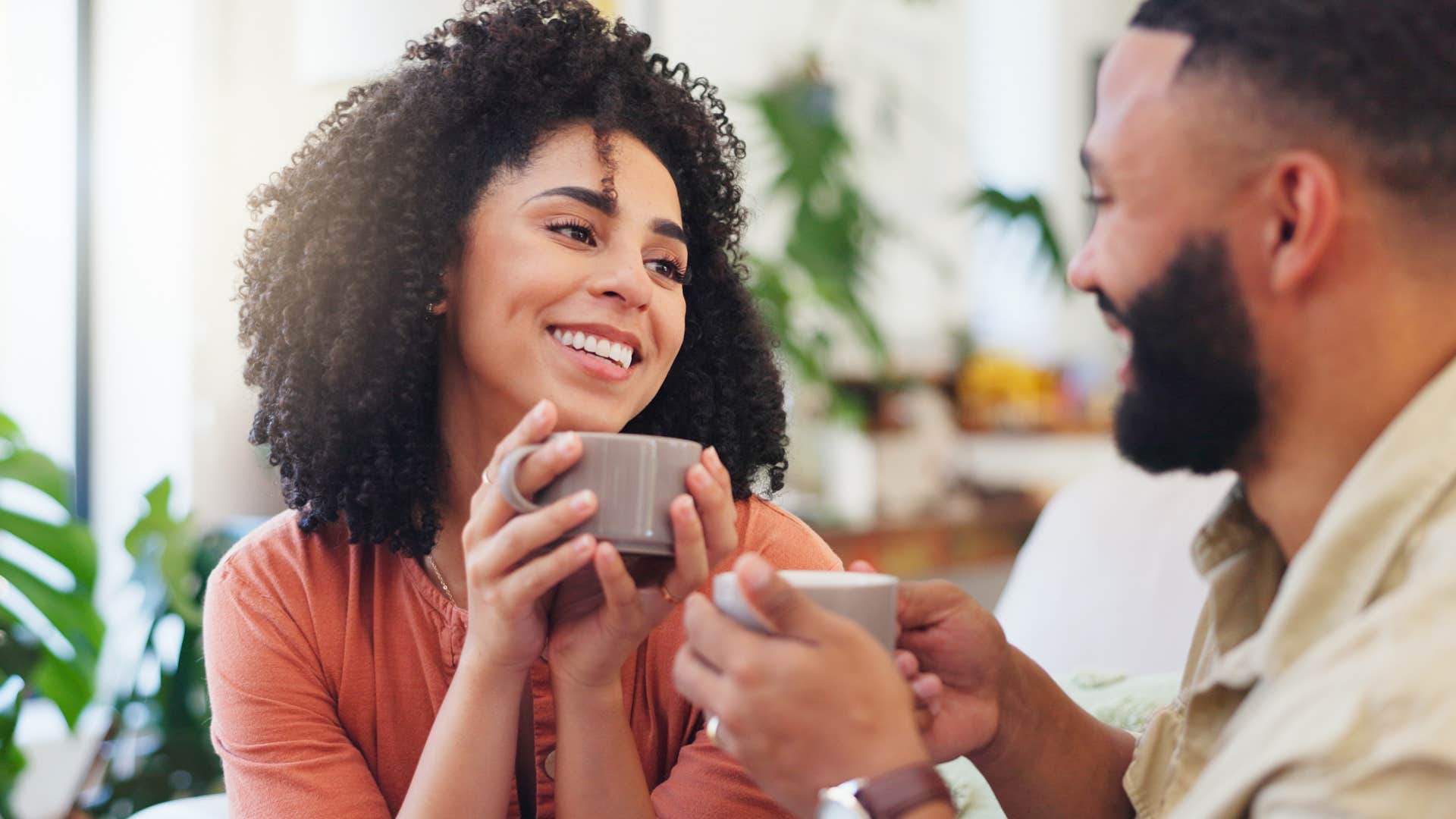 Woman who's mindful of social media usage talking to her partner.