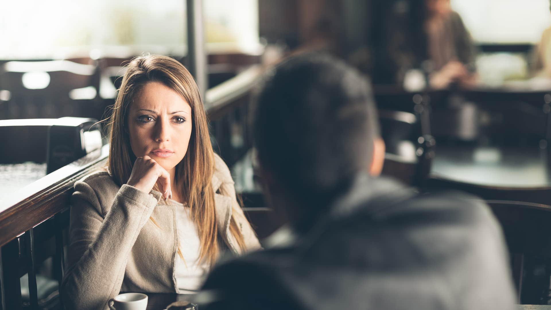 woman exhausted by man's illogical thinking