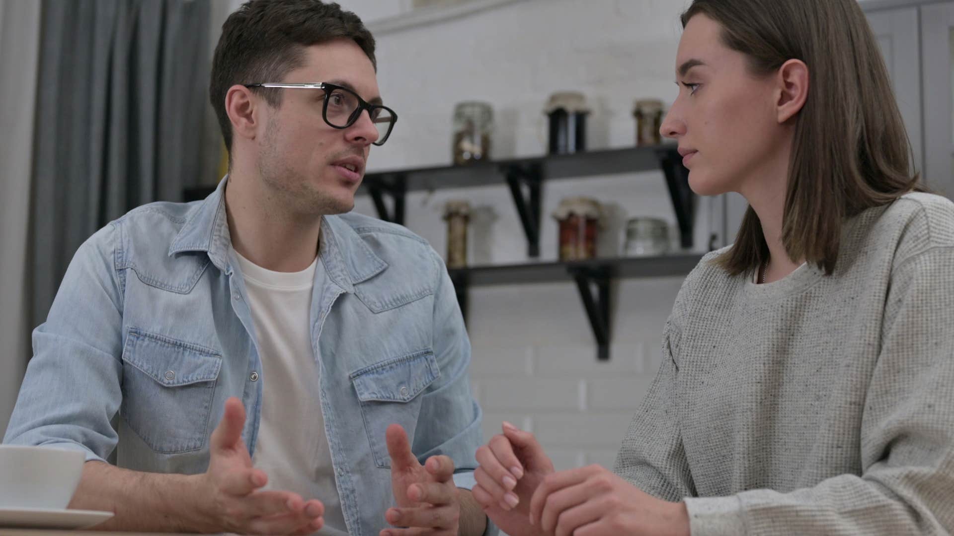 Man saying "you always take things the wrong way" to his partner.