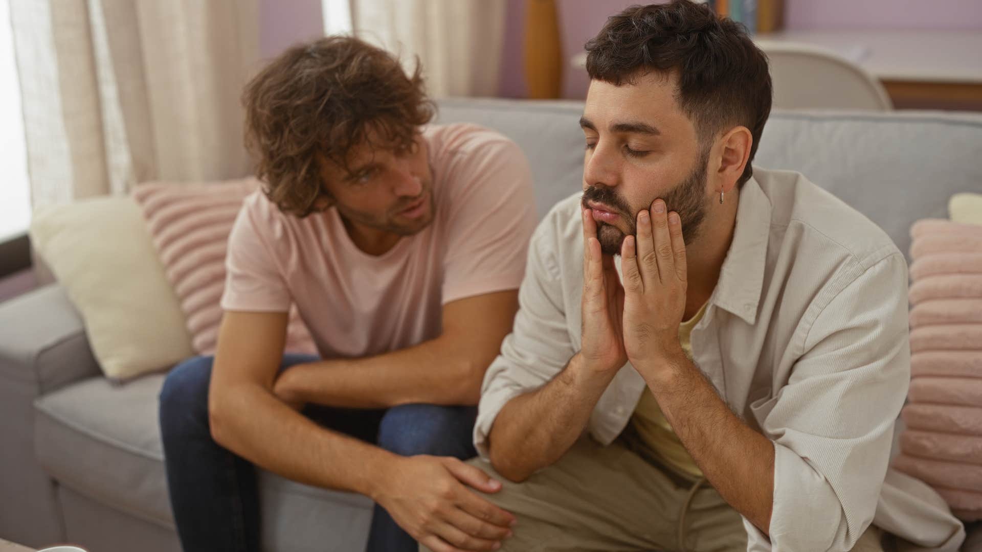 Upset man saying "that's not really my thing" to his partner.