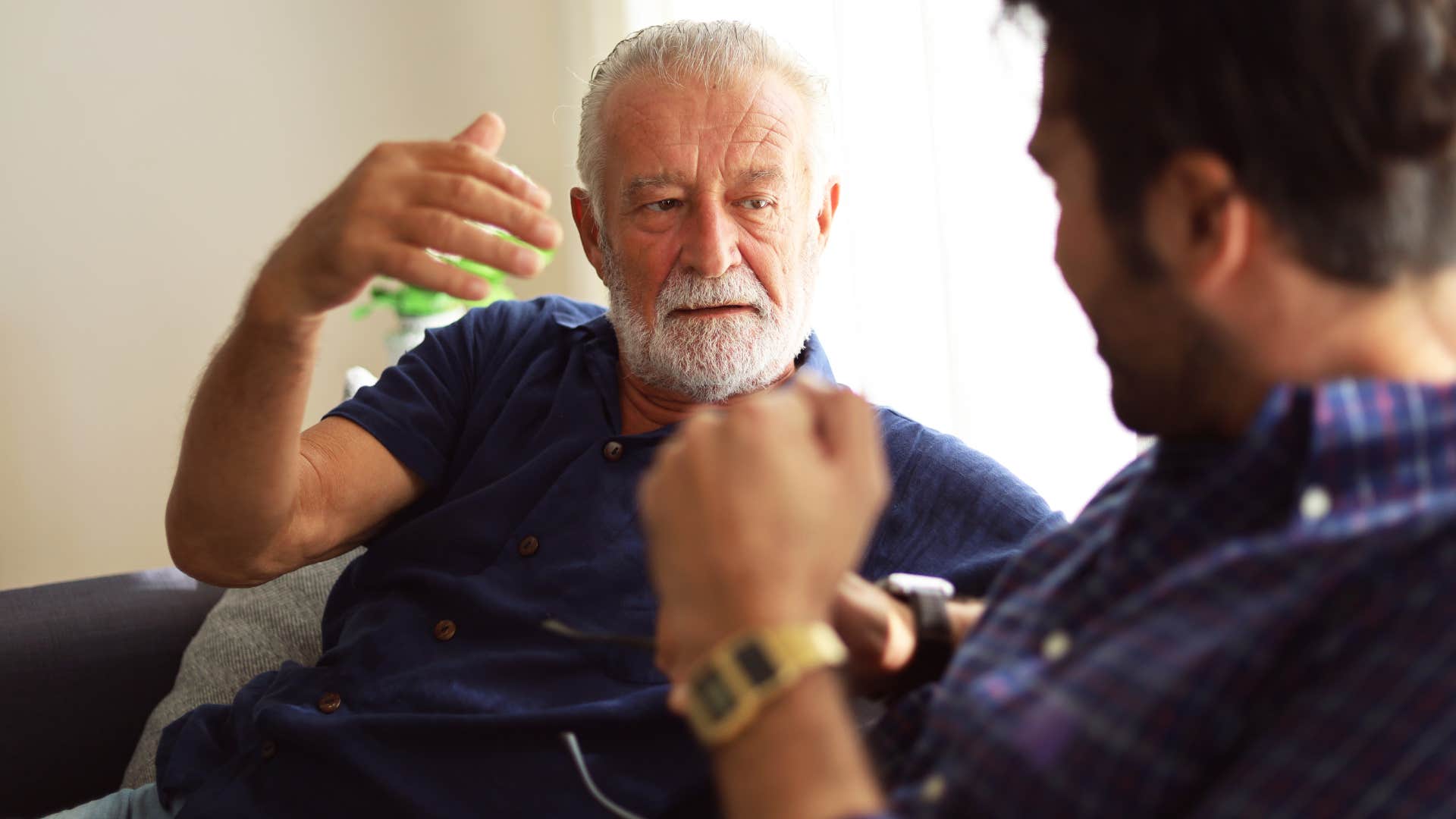 Man saying "you're always so dramatic" to his son.