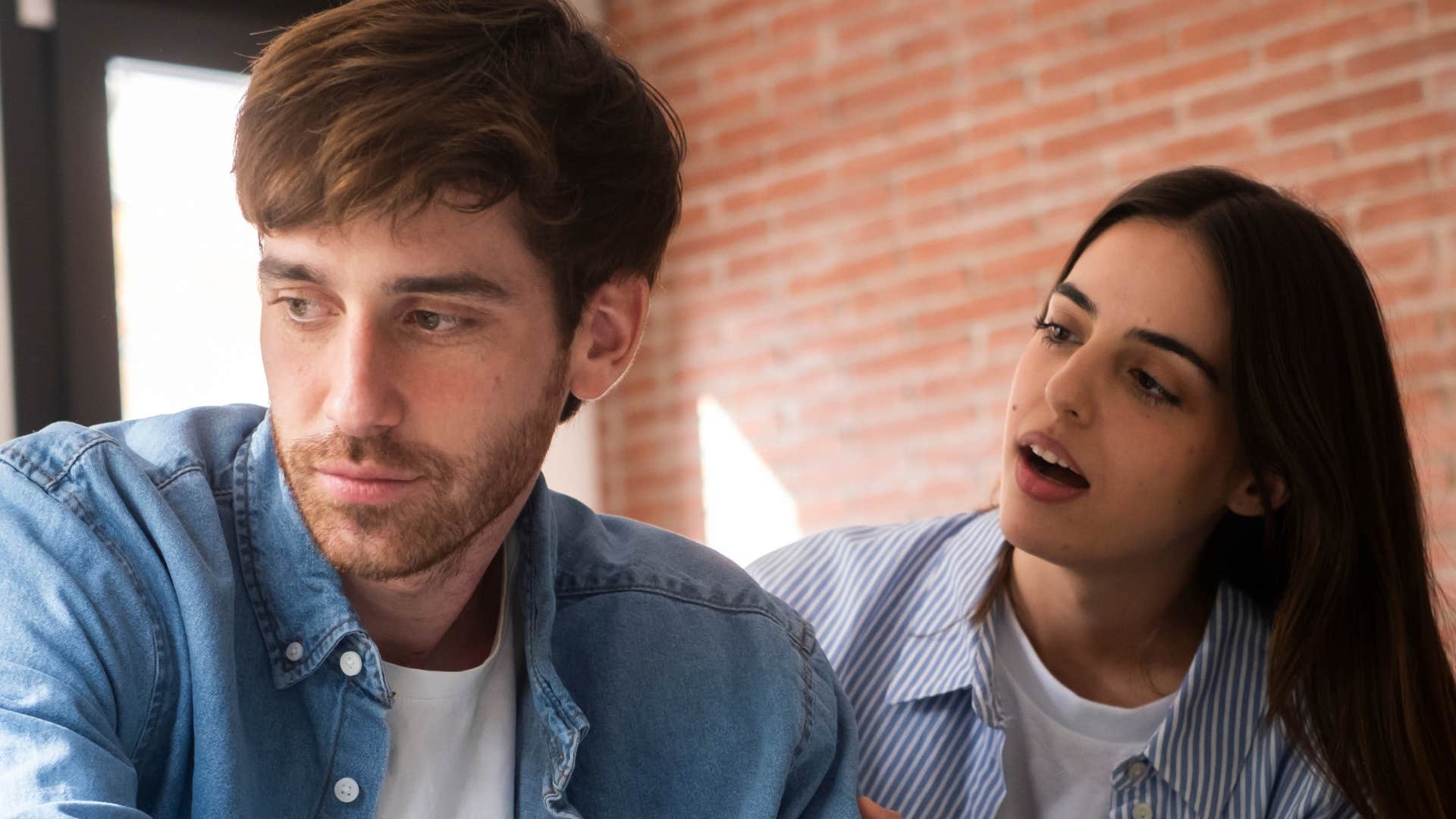 Man saying "you're overthinking it" to his partner.