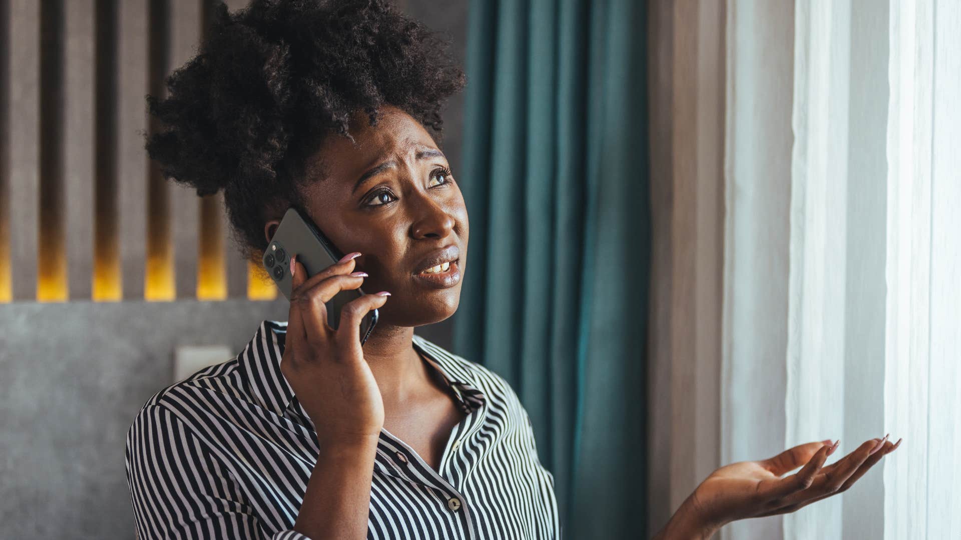 woman having negative conversations with chronic complainers on the phone