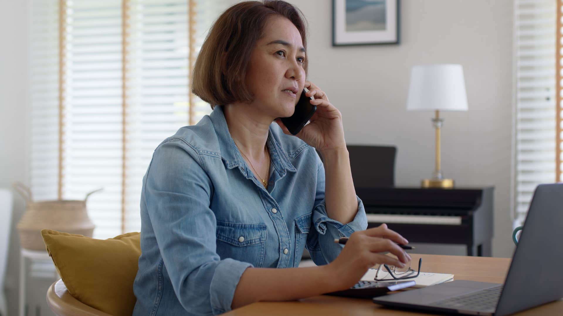 woman who dislikes surface-level small talk speaking on the phone