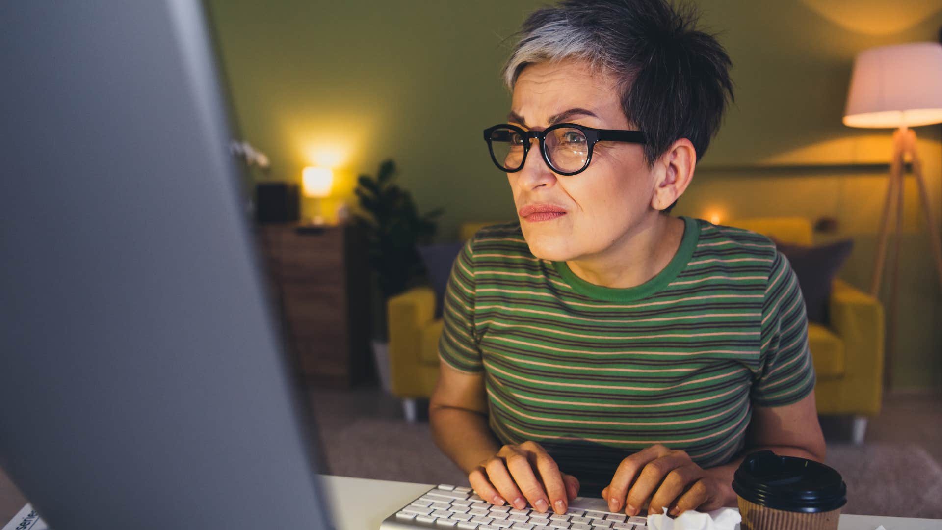 woman annoyed by unnecessarily complex topics on her computer