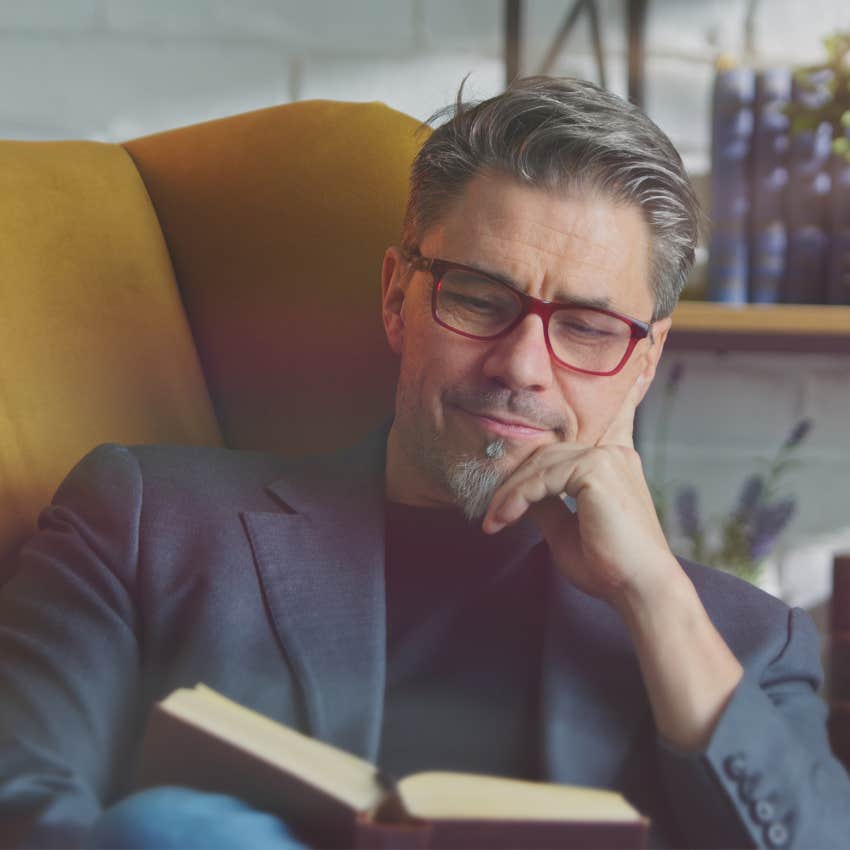 Man who's comfortable with silence reading at home
