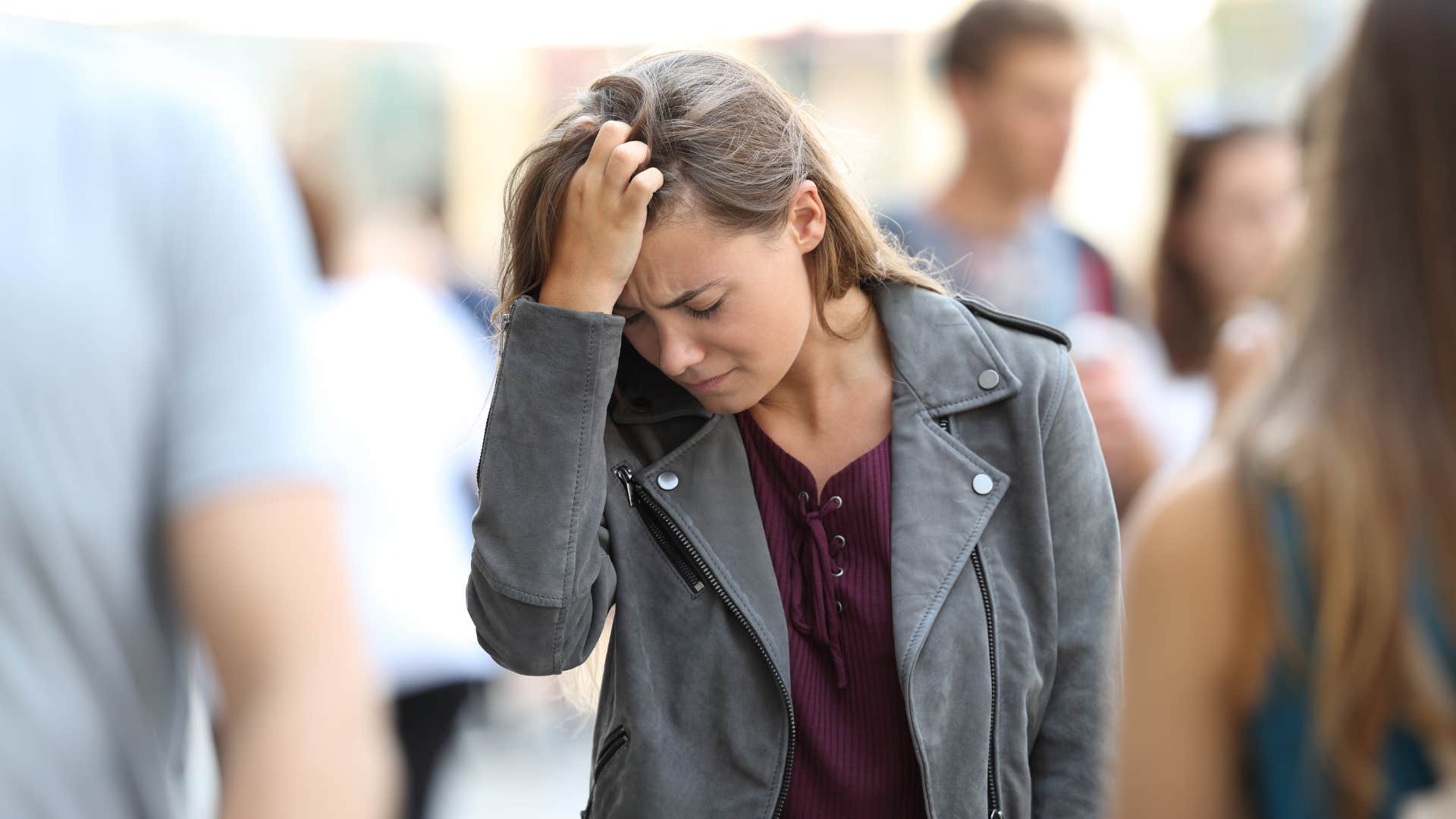 teen embarrassed having to walk to school while her peers are driven