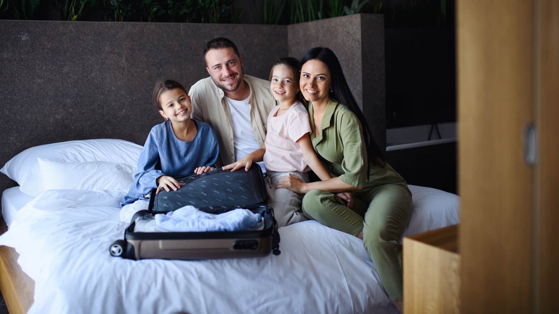 family who doesnt have enough money taking a vacation at a local hotel