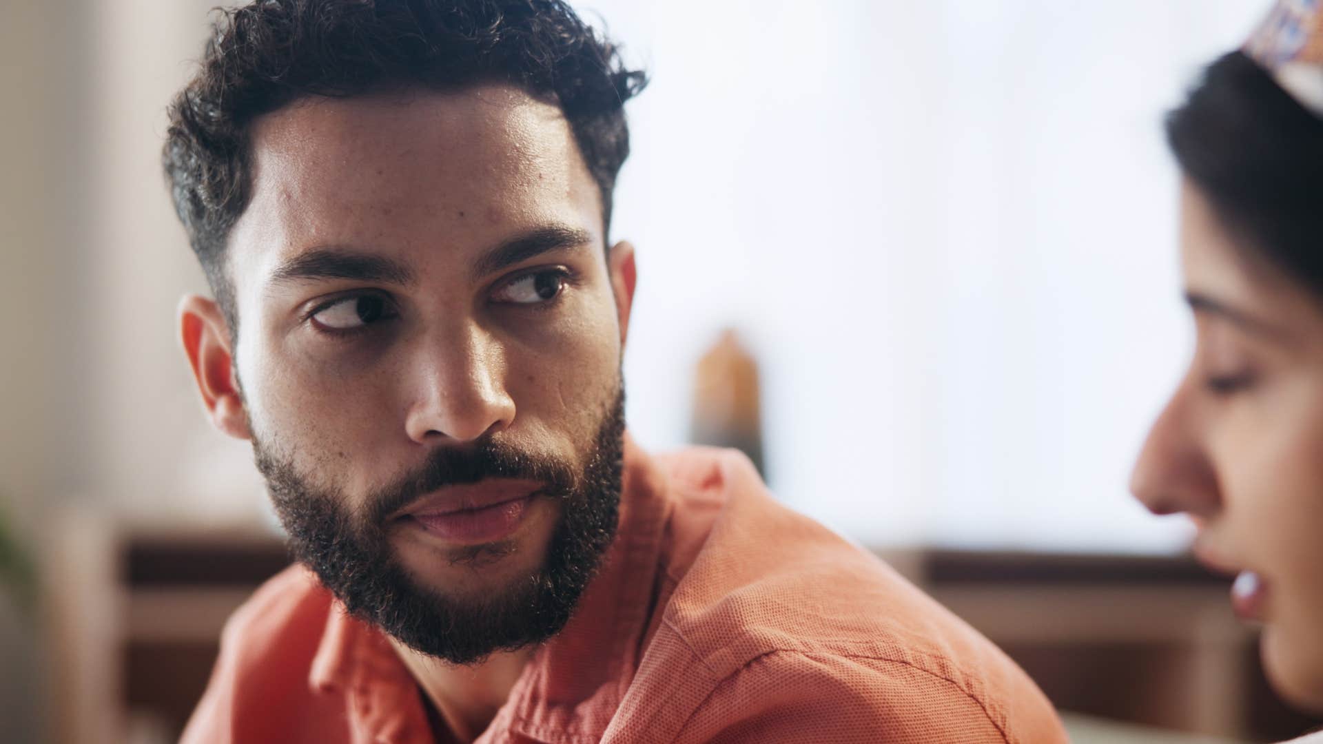 Man saying "I don't want to talk about this" to his partner.