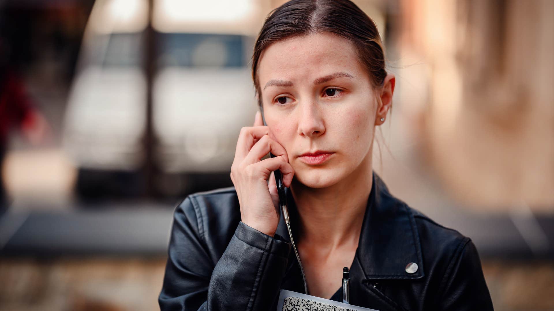 Woman saying "that's not what I meant" on the phone.
