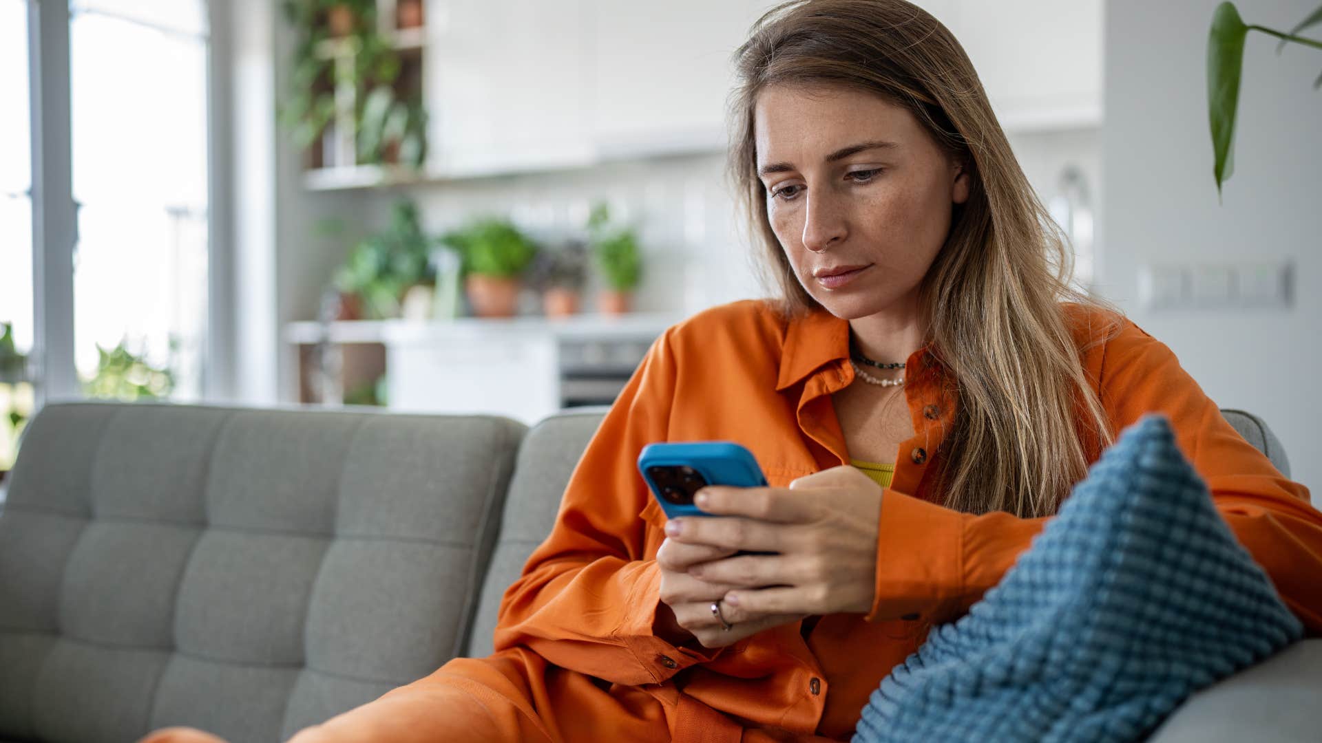 avoidant woman using her phone