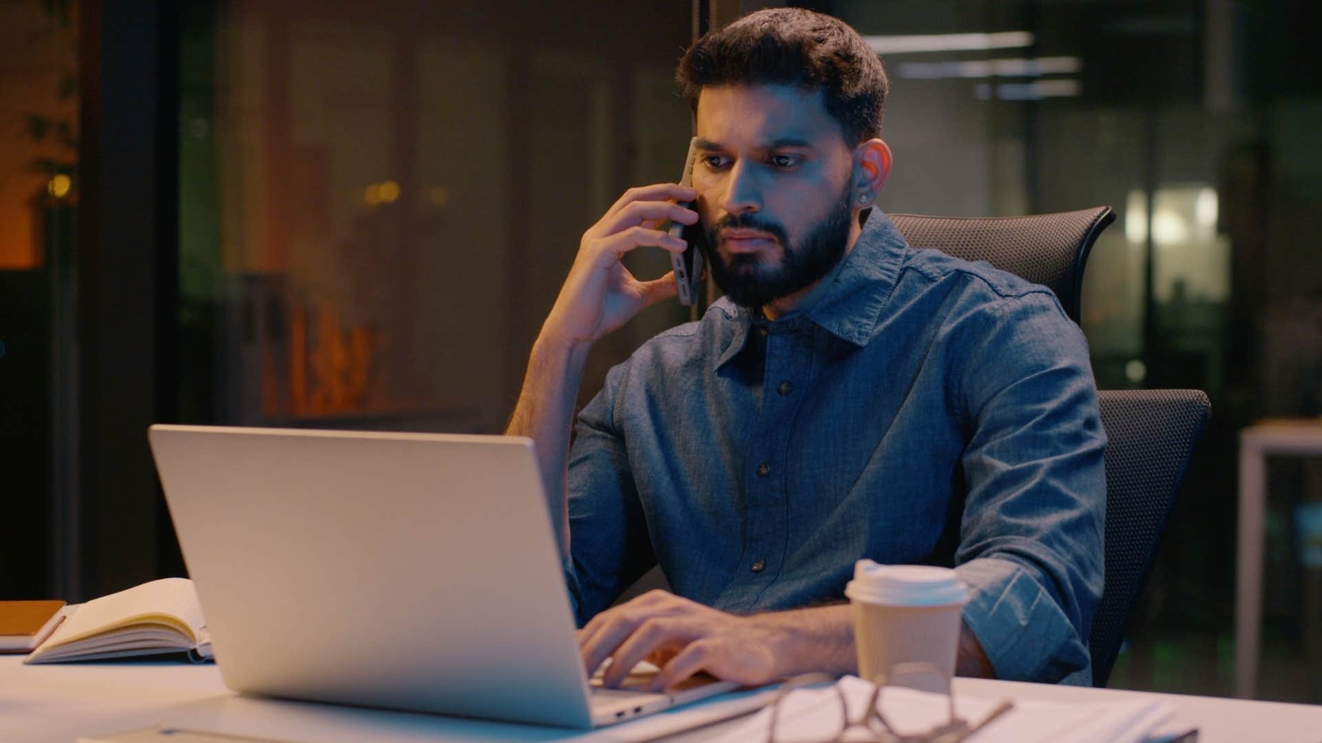 man who's a workaholic staying up late on his computer
