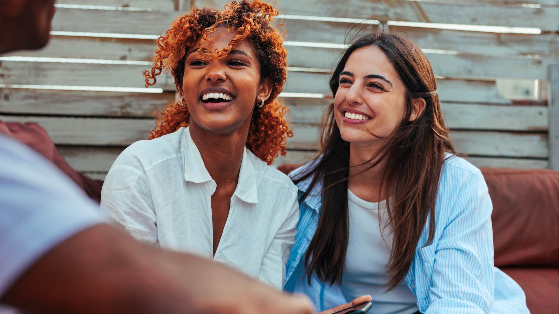 Relaxed friends speak their minds showing emotional gift